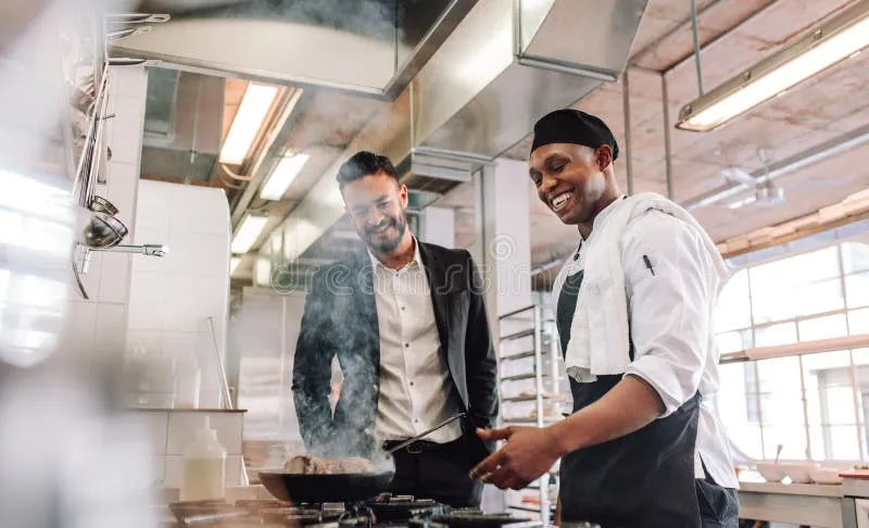 A passionate business owner preparing food with care and dedication