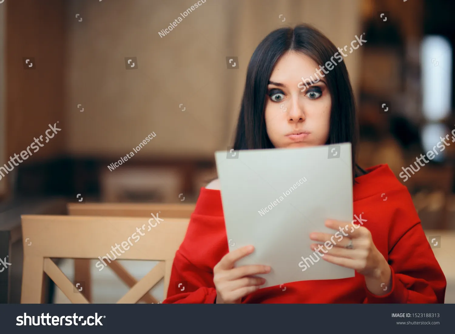 stock-photo-surprised-woman-reading-legal-documents-in-a-restaurant-unhappy-person-receiving-concerning-news-1523188313 The unexpected revelation of a lifechanging inheritance